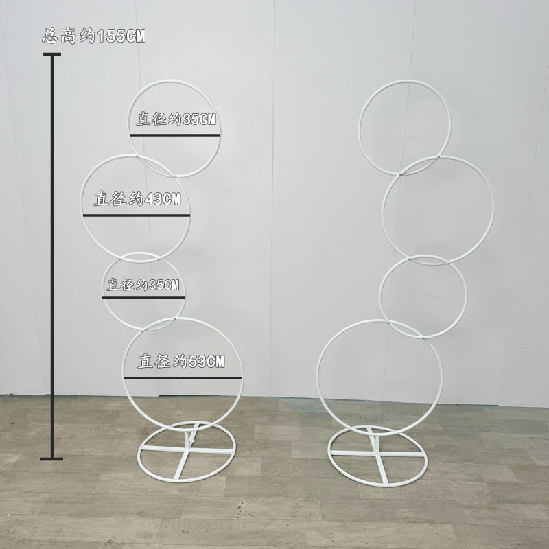 A wrought iron flower stand road guide