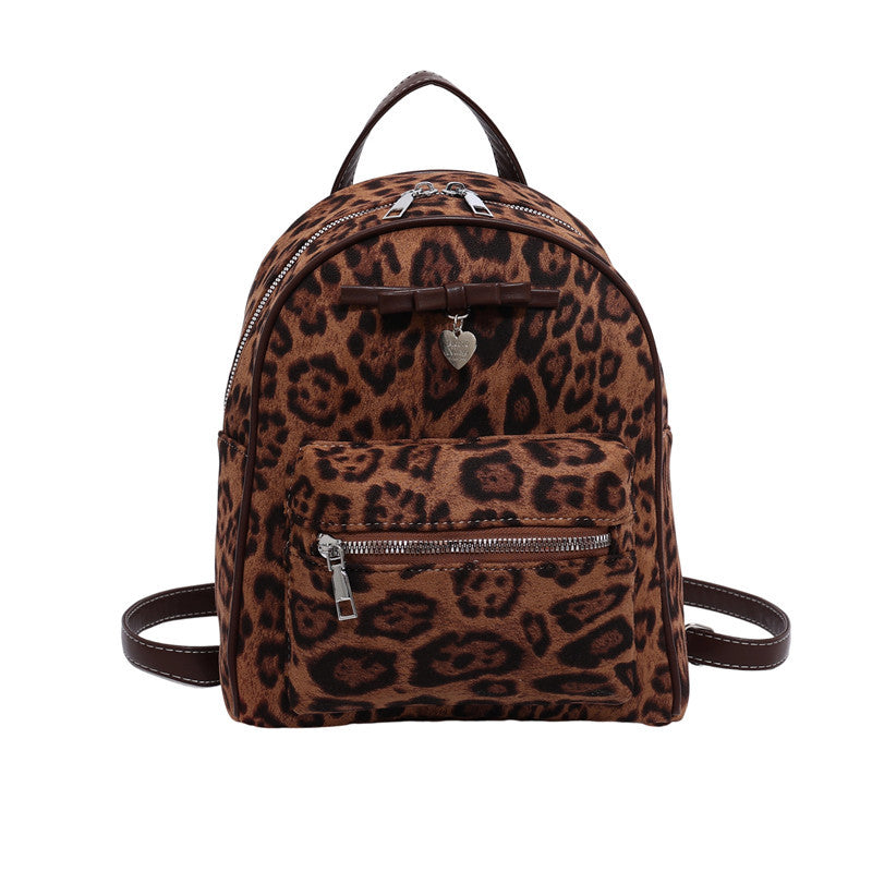 A flannel leopard print backpack