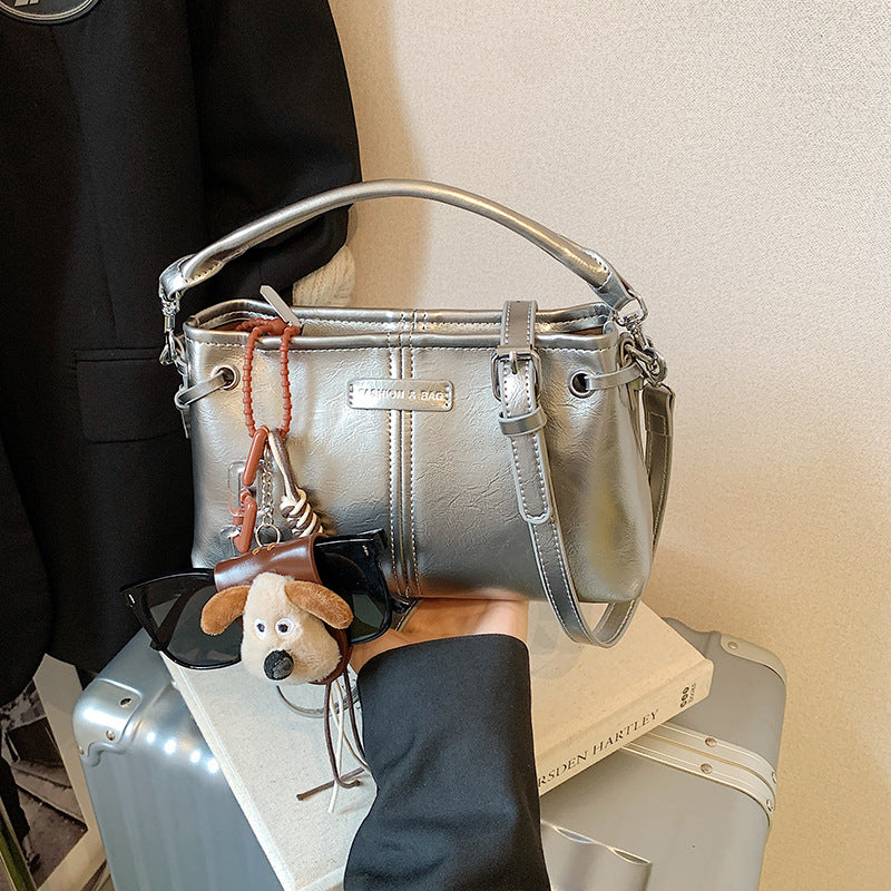 A handbag messenger bag
