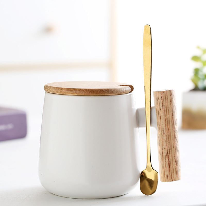 A wooden handle ceramic water cup