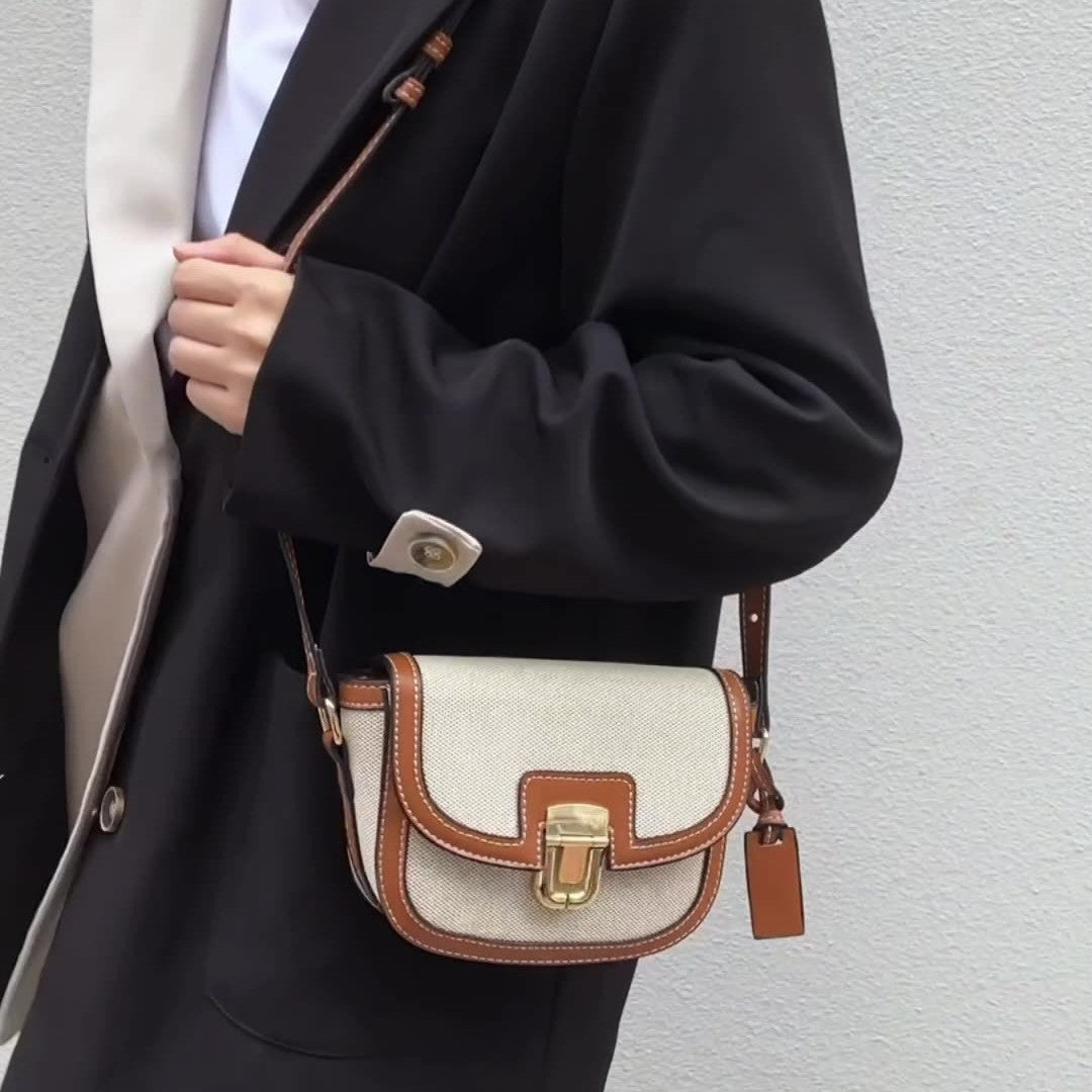 A autumn new Korean niche contrasting color single shoulder diagonal span saddle bag retro versatile underarm small bag women