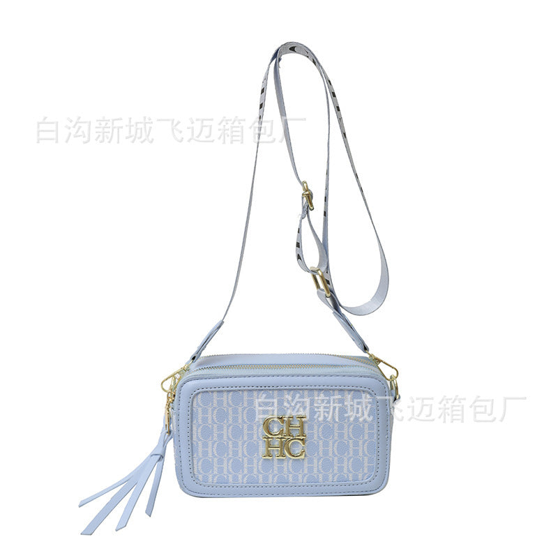 A Europe and the United States new personality letter style color fashion popular letter solid color shoulder messenger bag tide