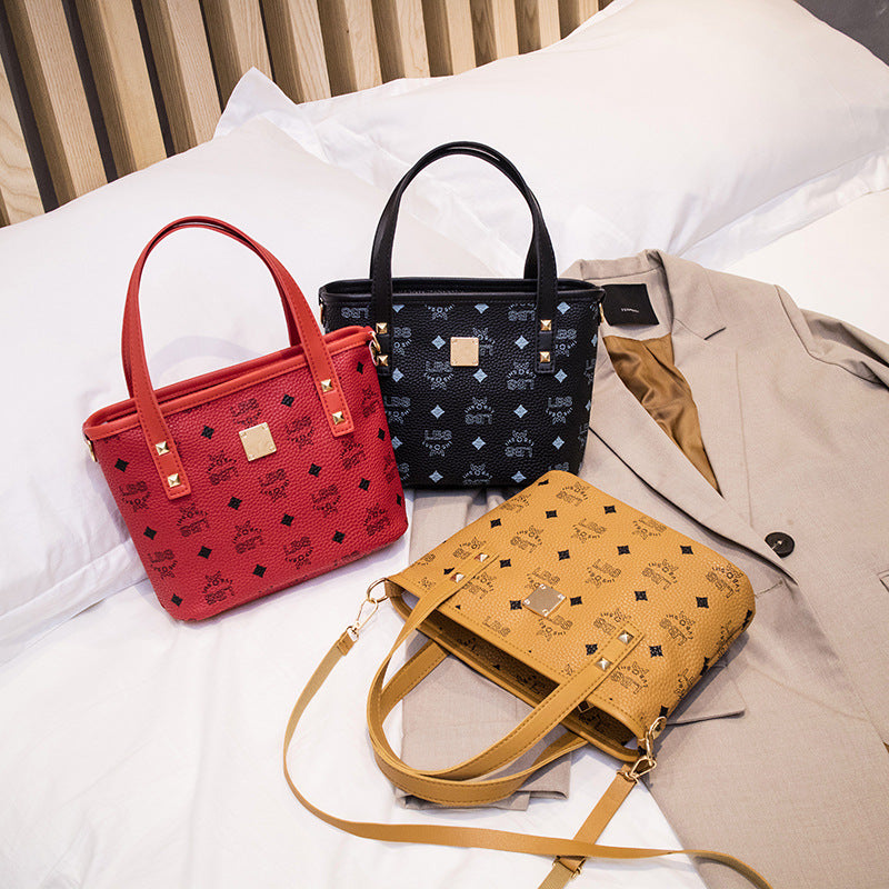 A retro European and American fashion shoulder crossbody portable bucket bag