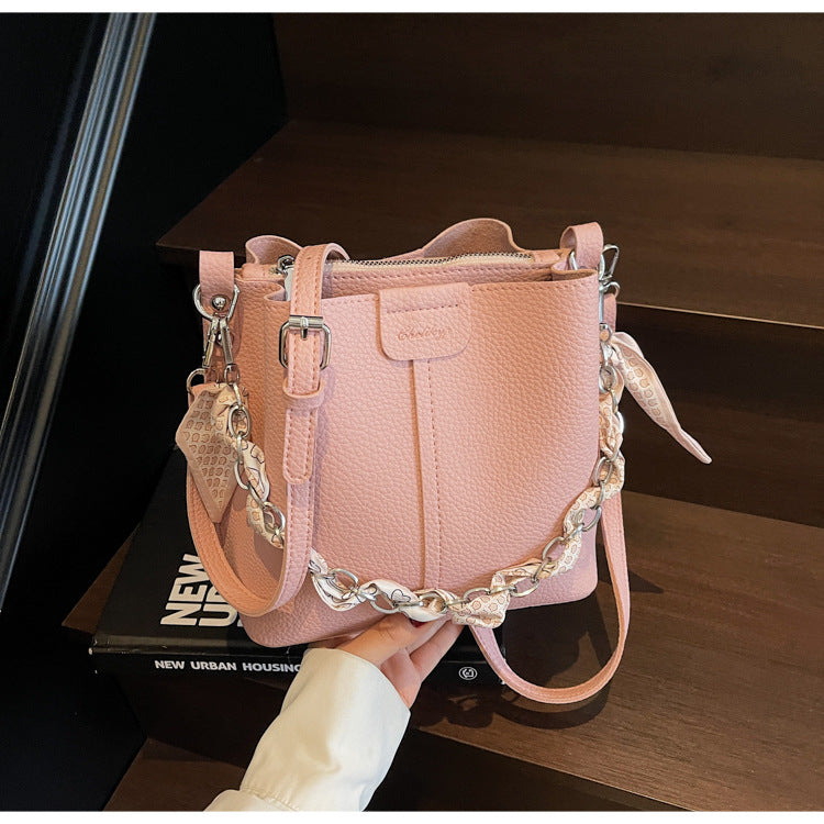 A handbag shoulder messenger bag