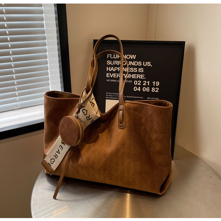 A frosted leather shoulder bag