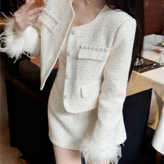 A Spring and Autumn Celebrity Splicing Button Bead Tassel Design Jacket New Fashion Small Fragrant Skirt Two-piece Set