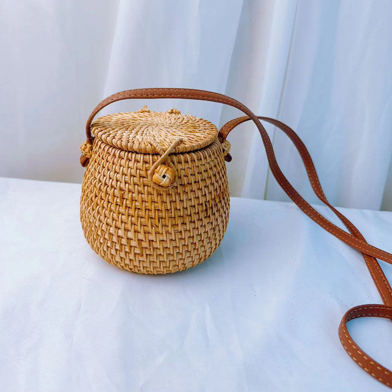 A rattan bag ins diagonal span mini bag Mori basket retro literary woven round bag vacation bucket bag leather buckle bag