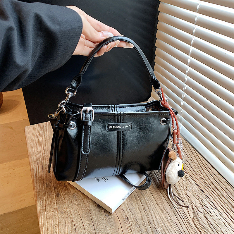 A handbag messenger bag