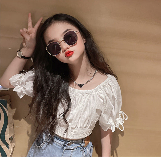 A new summer girls fashionable suit children's Internet celebrity big children's foreign style off-the-shoulder doll shirt + denim skirt