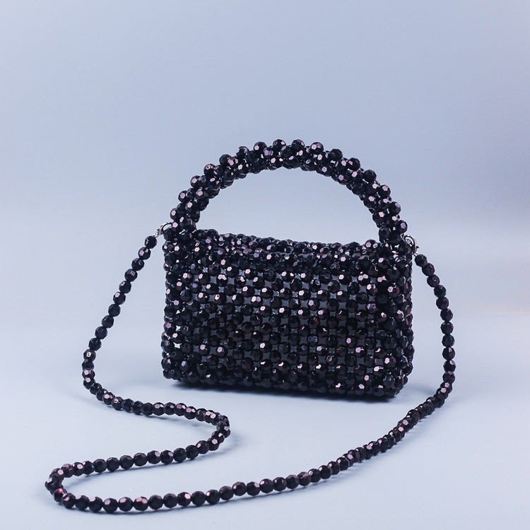 A simple black horn bead acrylic handbag bag handmade beaded woven portable messenger bag