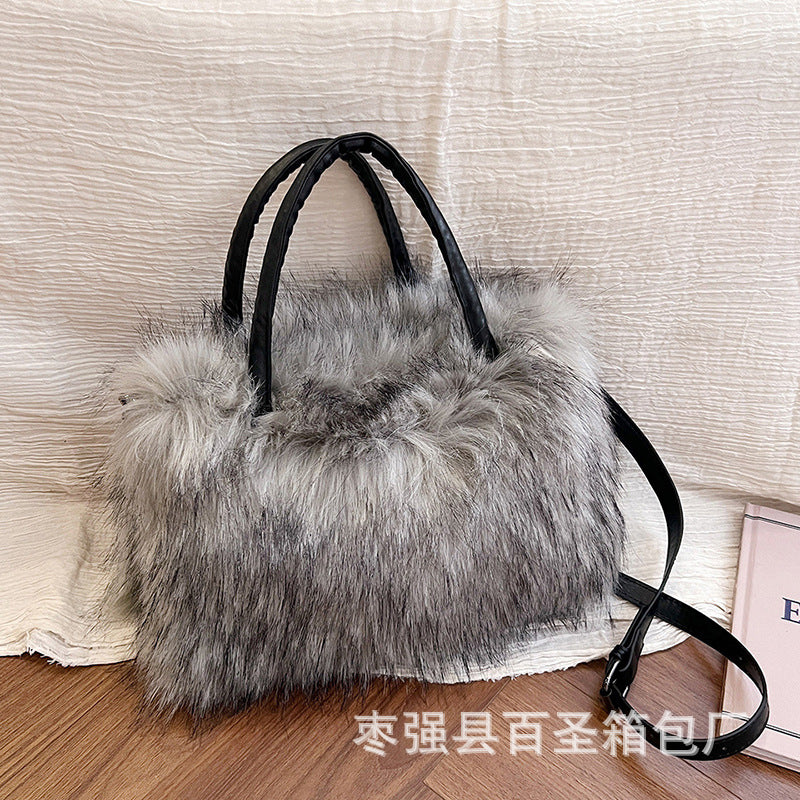A Plush raccoon fur handbag