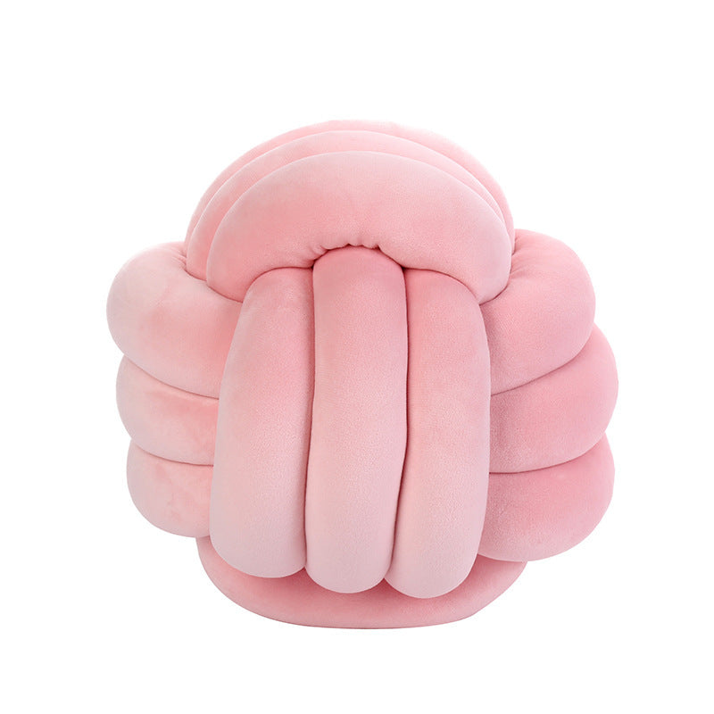 A braided ball pillow