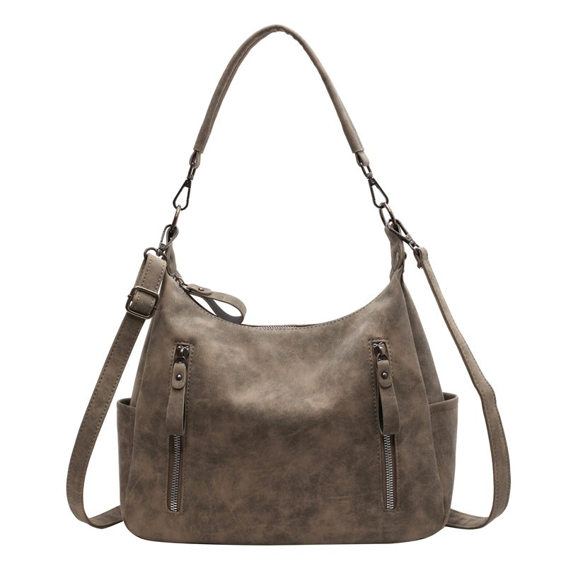 A handbag shoulder messenger bag