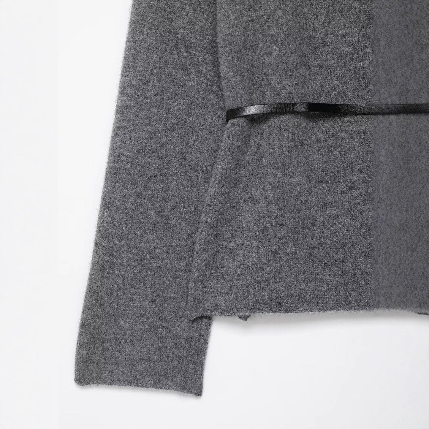 A knitted cardigan sweater jacket