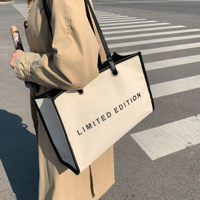 A trendy personalized shoulder bag alphabet printed canvas women's bag