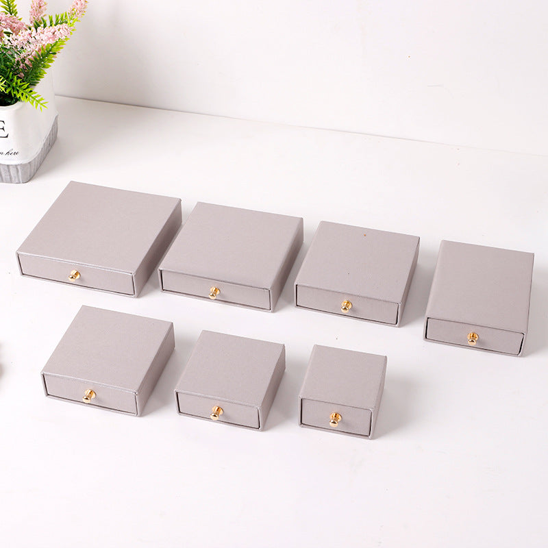A rivet drawer jewelry box hot gold stamping process