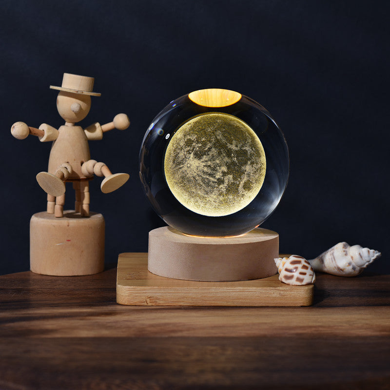 A creative 3d laser engraved crystal ball lamp