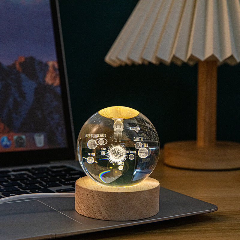 A creative 3d laser engraved crystal ball lamp
