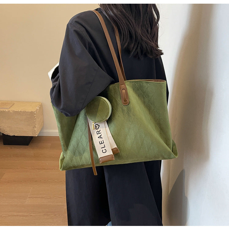 A frosted leather shoulder bag