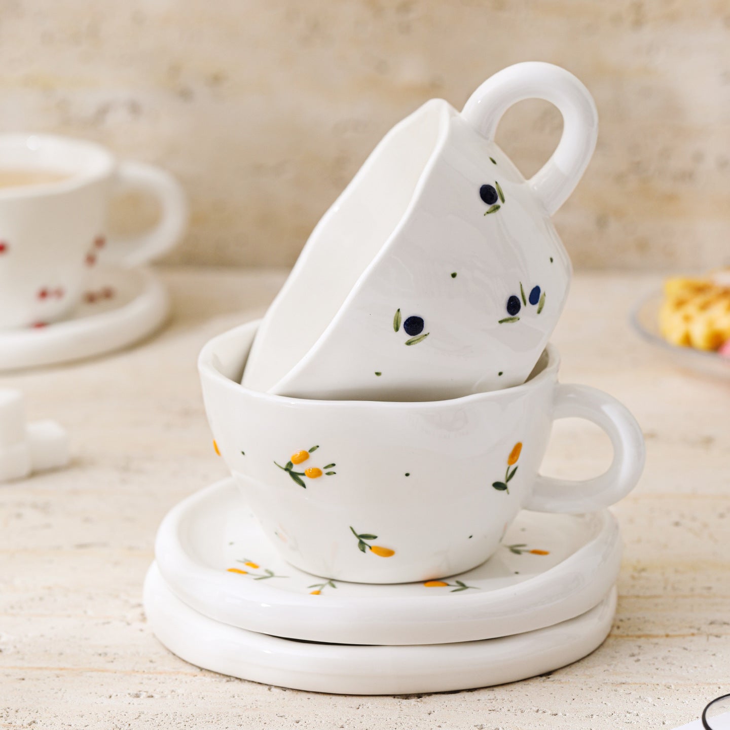 A Embossed Ceramic Coffee Cup and Saucer Set