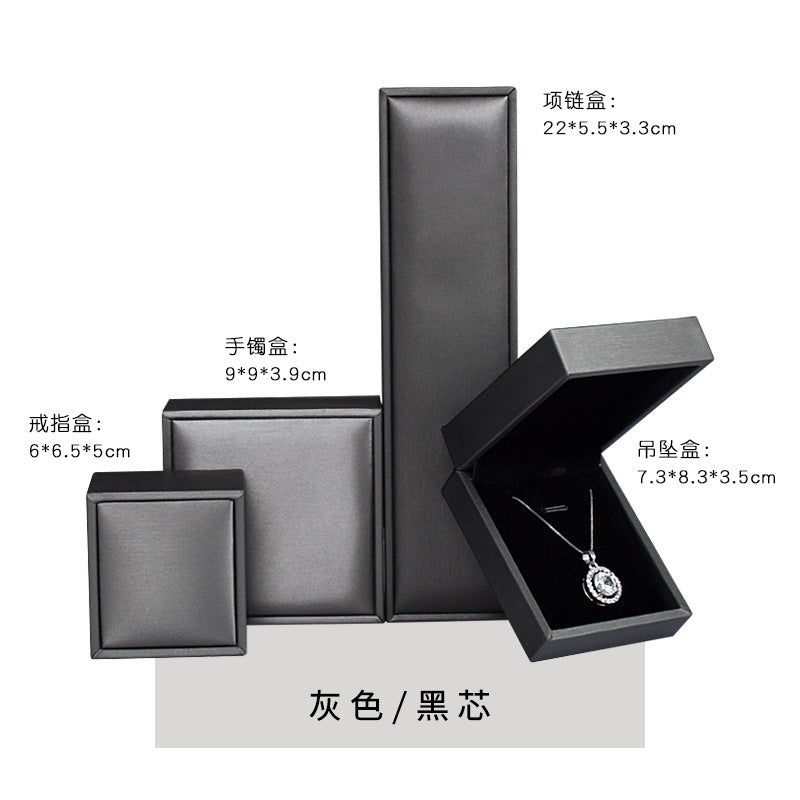 A brushed PU leather bronzing LOGO jewelry box