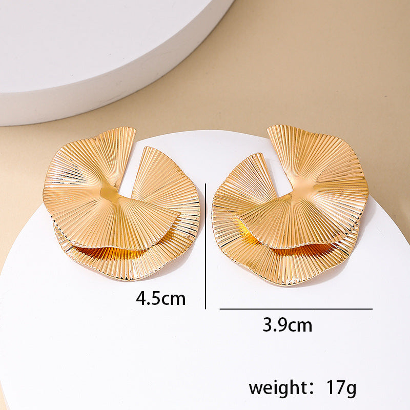 A Cross-border new twisted fan-shaped women's earrings European and American design sense fashion personality dinner stud earrings wholesale - Mixbatch
