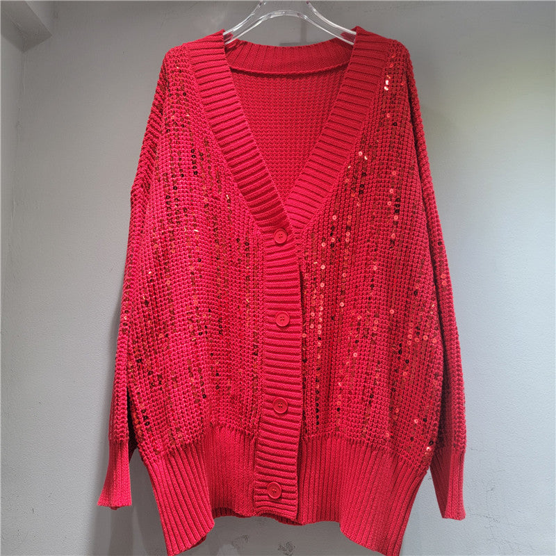 A long-sleeved V-neck sequined knit top