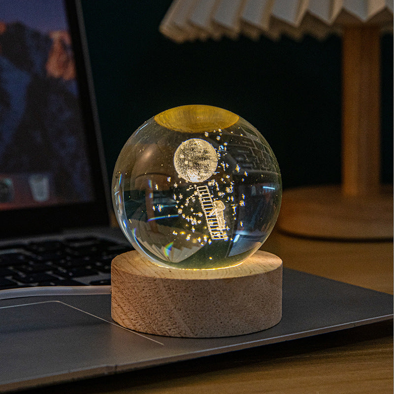A creative 3d laser engraved crystal ball lamp
