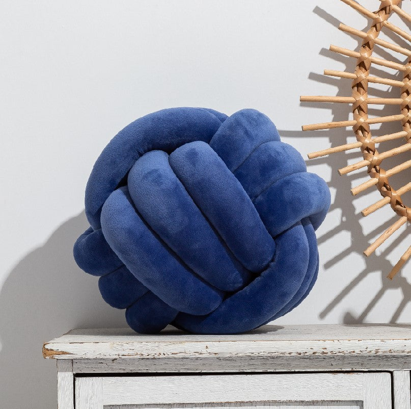 A braided ball pillow