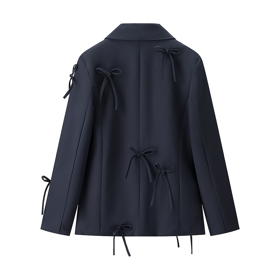 A bow-embellished blazer