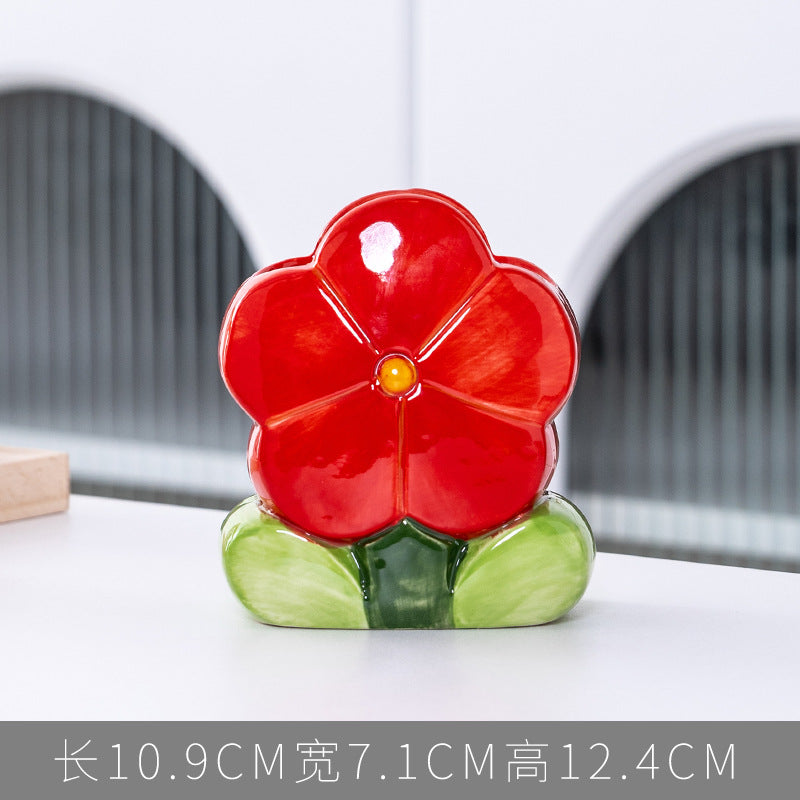 A ceramic pen holder storage ornament
