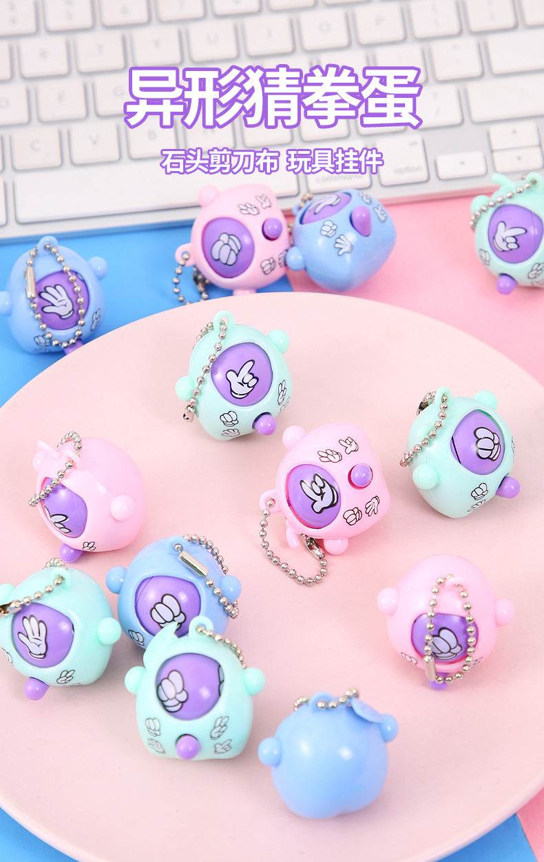 A guessing egg keychain scissors stone cloth face twisting egg