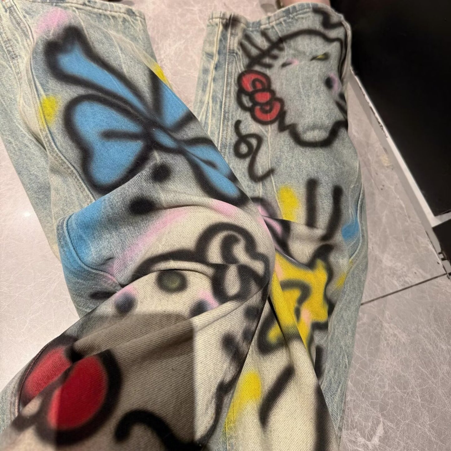 A graffiti print jeans