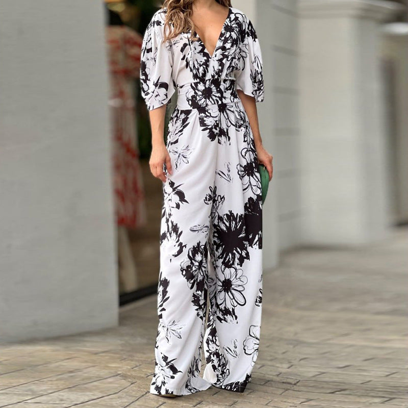 A new European and American women's clothing ins fashionable and elegant printing bat sleeve waist V-neck women's jumpsuit women's 661