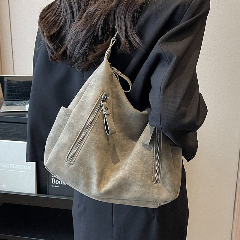 A handbag shoulder messenger bag