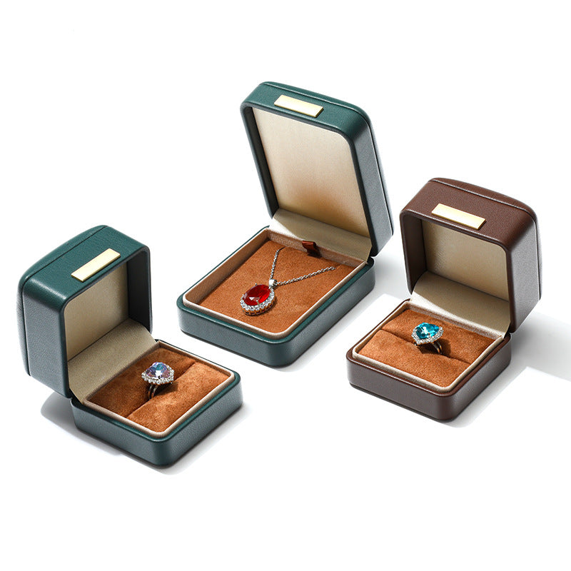 A Arched Leather Ring Jewelry Box
