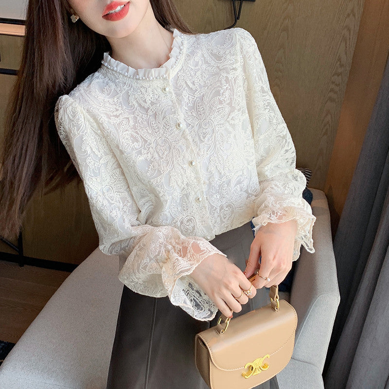 A spring new hollow long-sleeved lace shirt blouse spring shirt