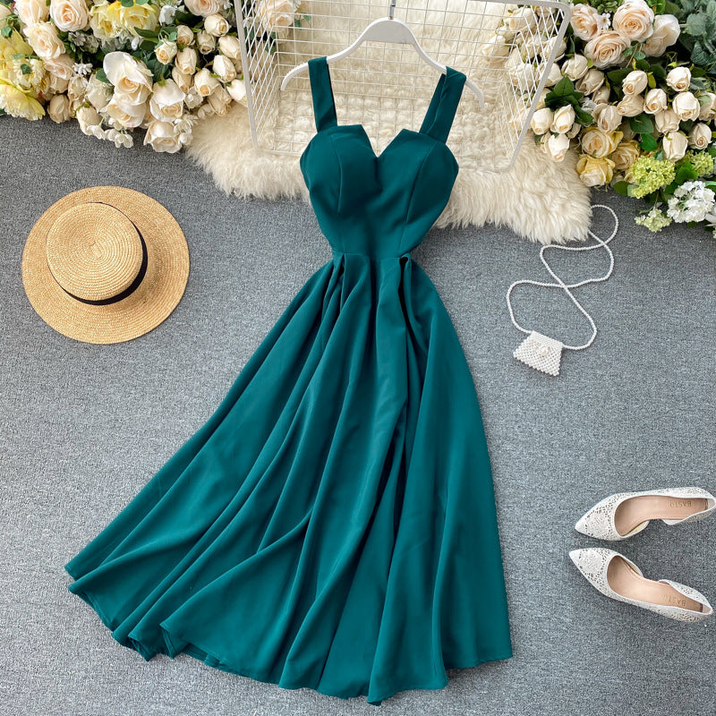 A backless solid color waist V-neck long dress women's dress