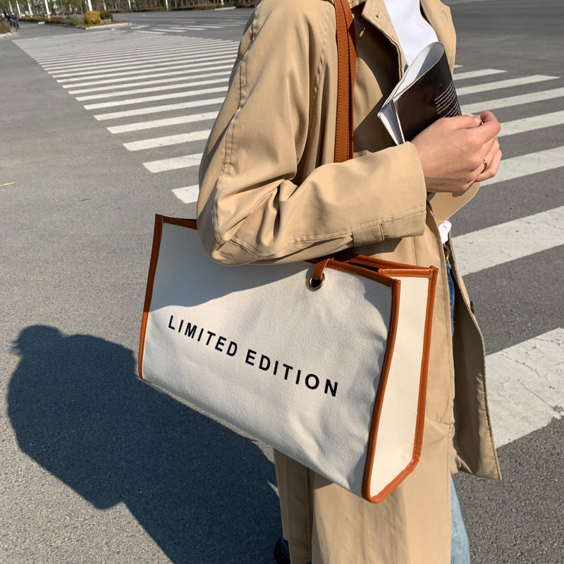 A trendy personalized shoulder bag alphabet printed canvas women's bag