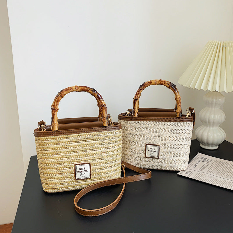 A summer new textured bamboo handle woven bag Thailand travel vacation fashion messenger straw bag