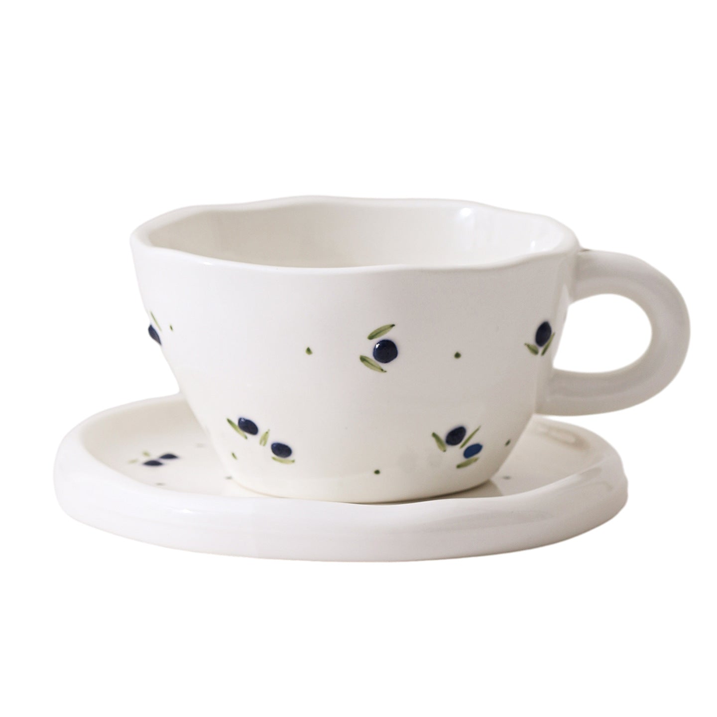A Embossed Ceramic Coffee Cup and Saucer Set