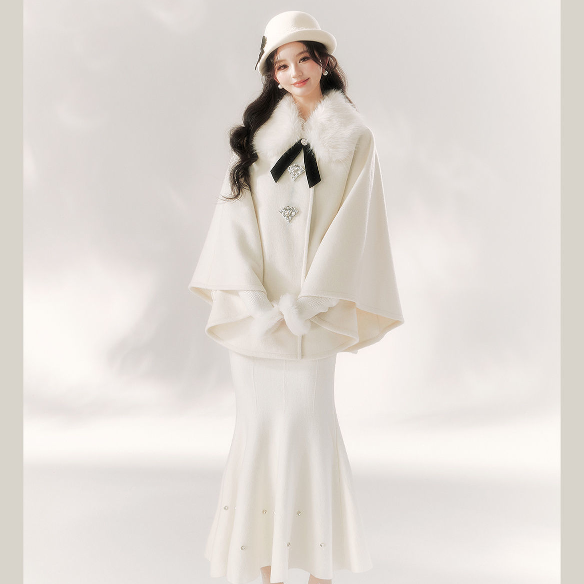 A Cape Coat and Skirt Set