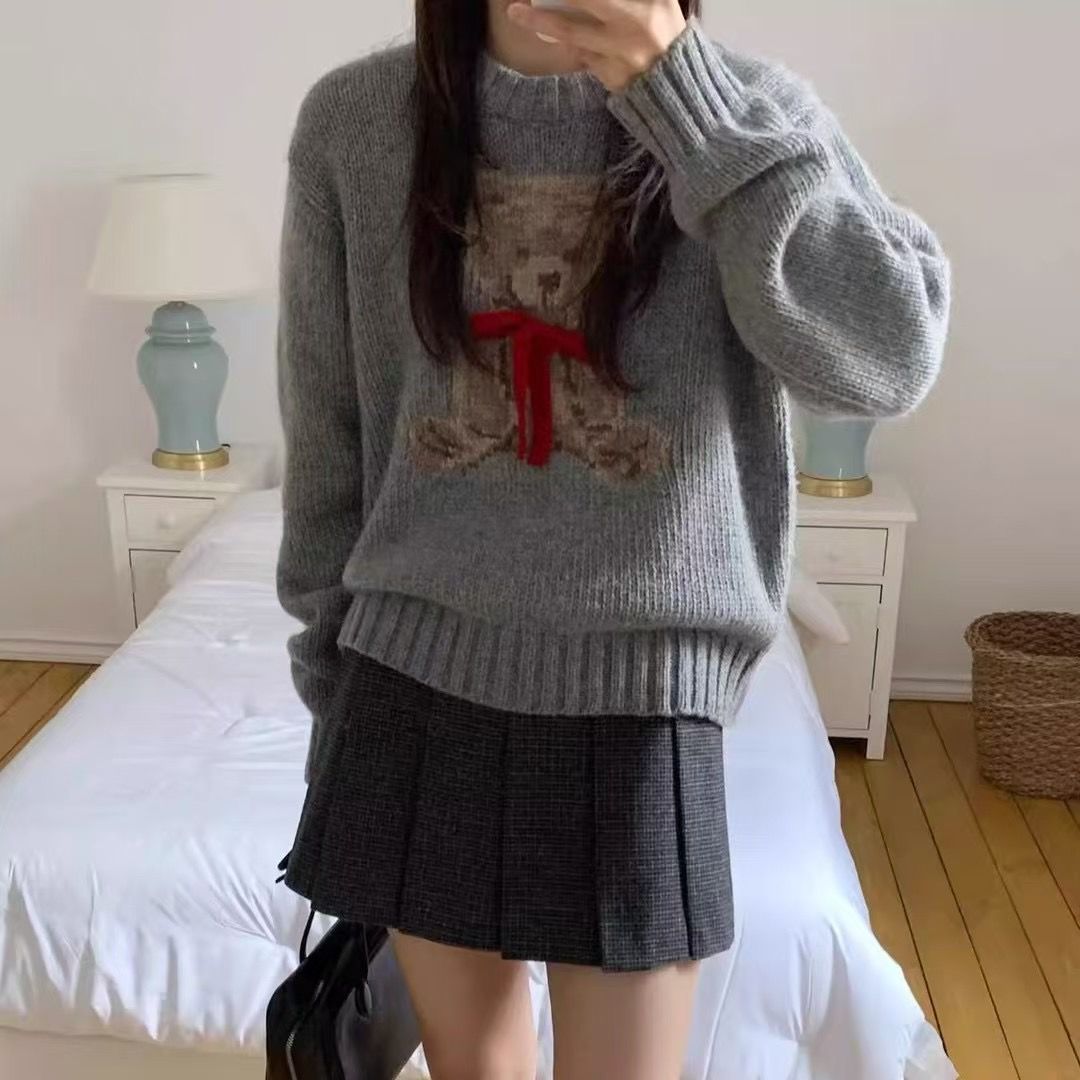 A cartoon crew neck sweater