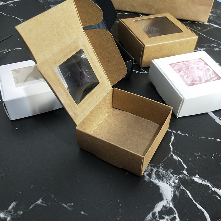 A Window opening hollow kraft paper box handmade soap packaging box folding trinkets airplane box happy candy box spot MQO: 500PIECE - Mixbatch