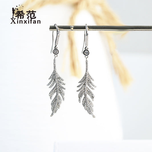 A sterling silver s925 full diamond feather earrings