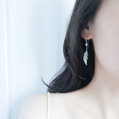 A sterling silver s925 full diamond feather earrings