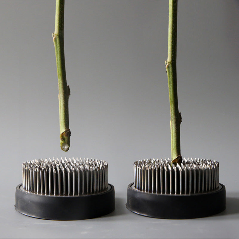 A Stainless Steel Flower Arrangement Base Needle Tool