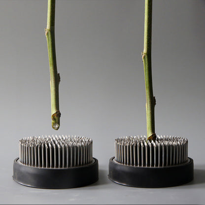 A Stainless Steel Flower Arrangement Base Needle Tool