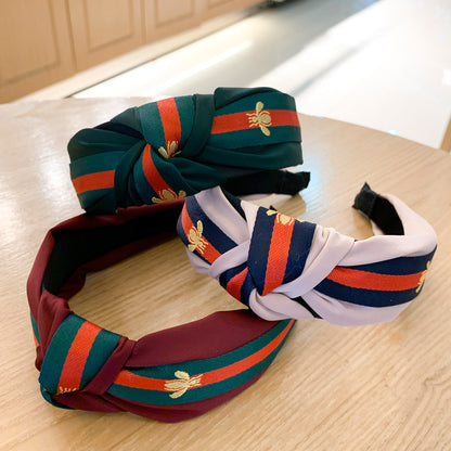 A lady bee knotted headband, Korean version, wide-sided simple headband, high cranial top stripe, wide-sided pressure headband, non-slip.