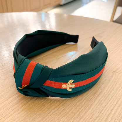 A lady bee knotted headband, Korean version, wide-sided simple headband, high cranial top stripe, wide-sided pressure headband, non-slip.